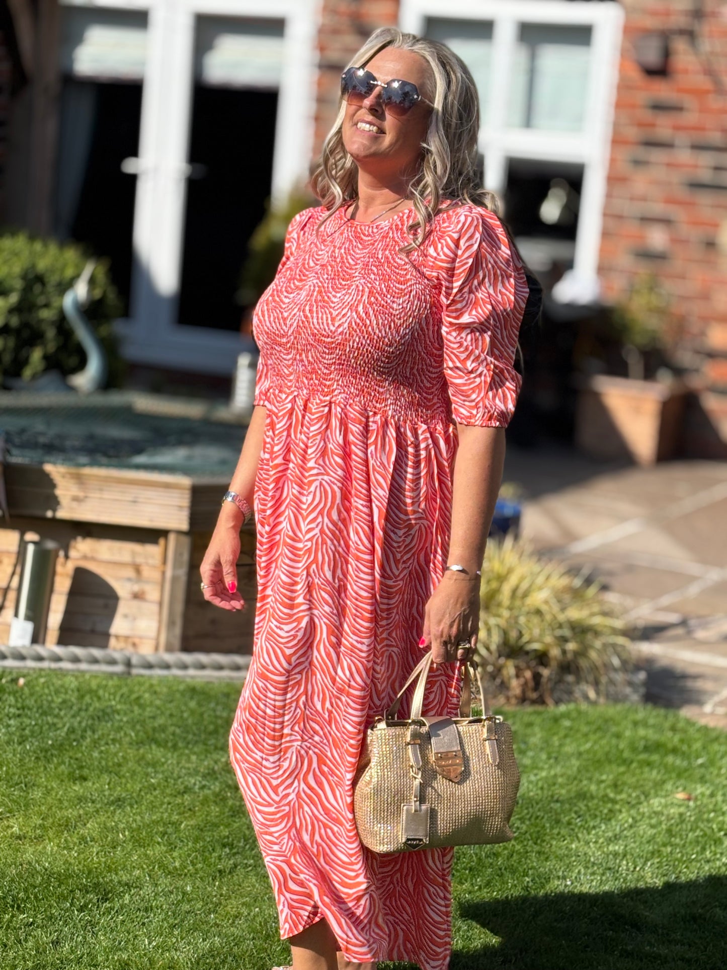 Ladies tiered dress with elasticated top ready for summer days